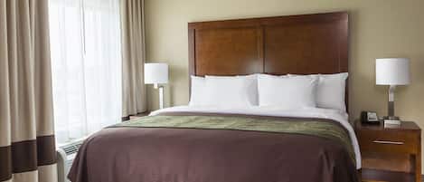 Premium bedding, pillowtop beds, desk, blackout drapes