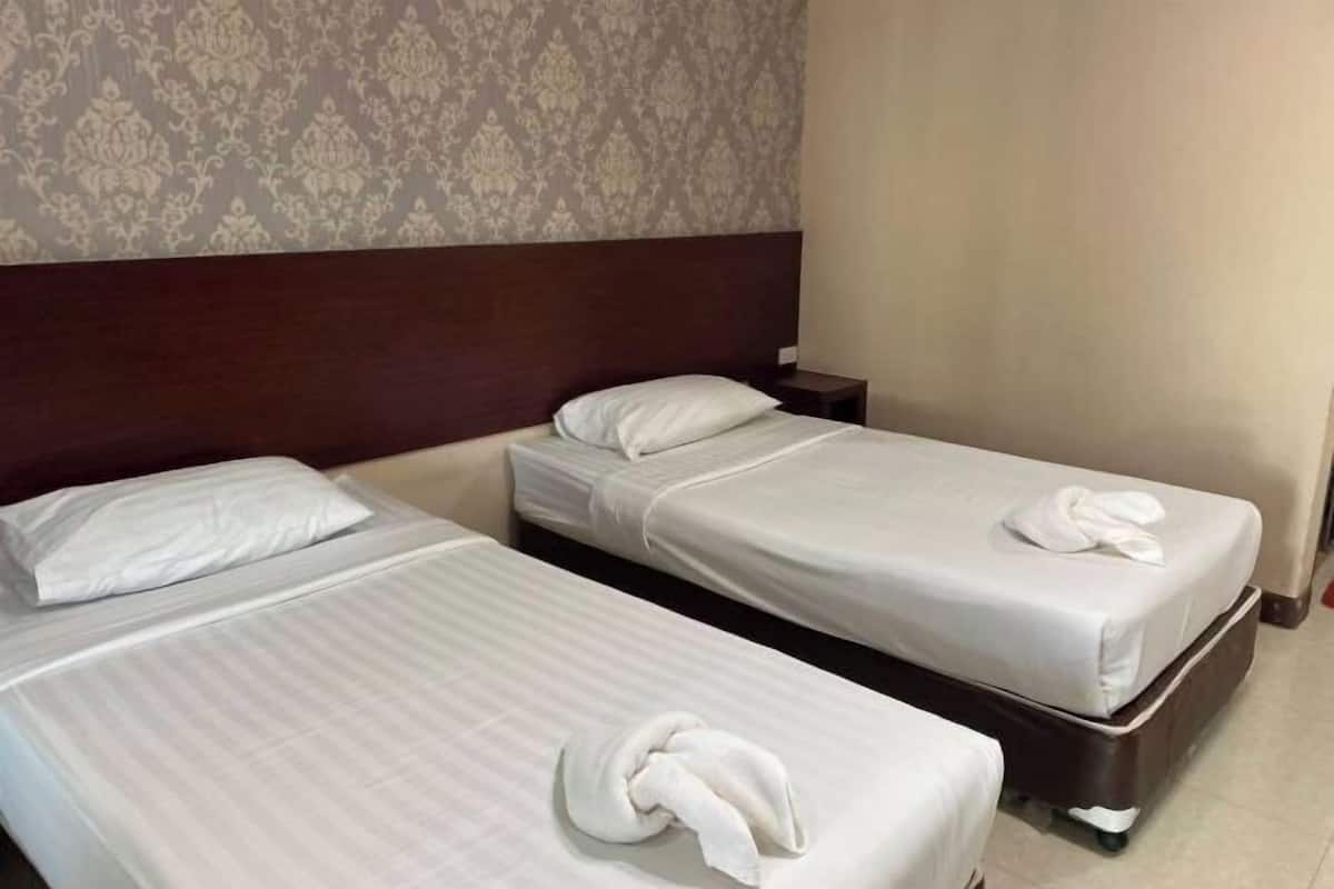 Blackout drapes, soundproofing, rollaway beds (surcharge), WiFi (free)