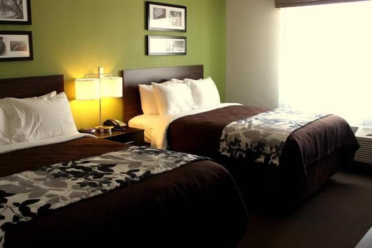 Desk, laptop workspace, blackout drapes, iron/ironing board