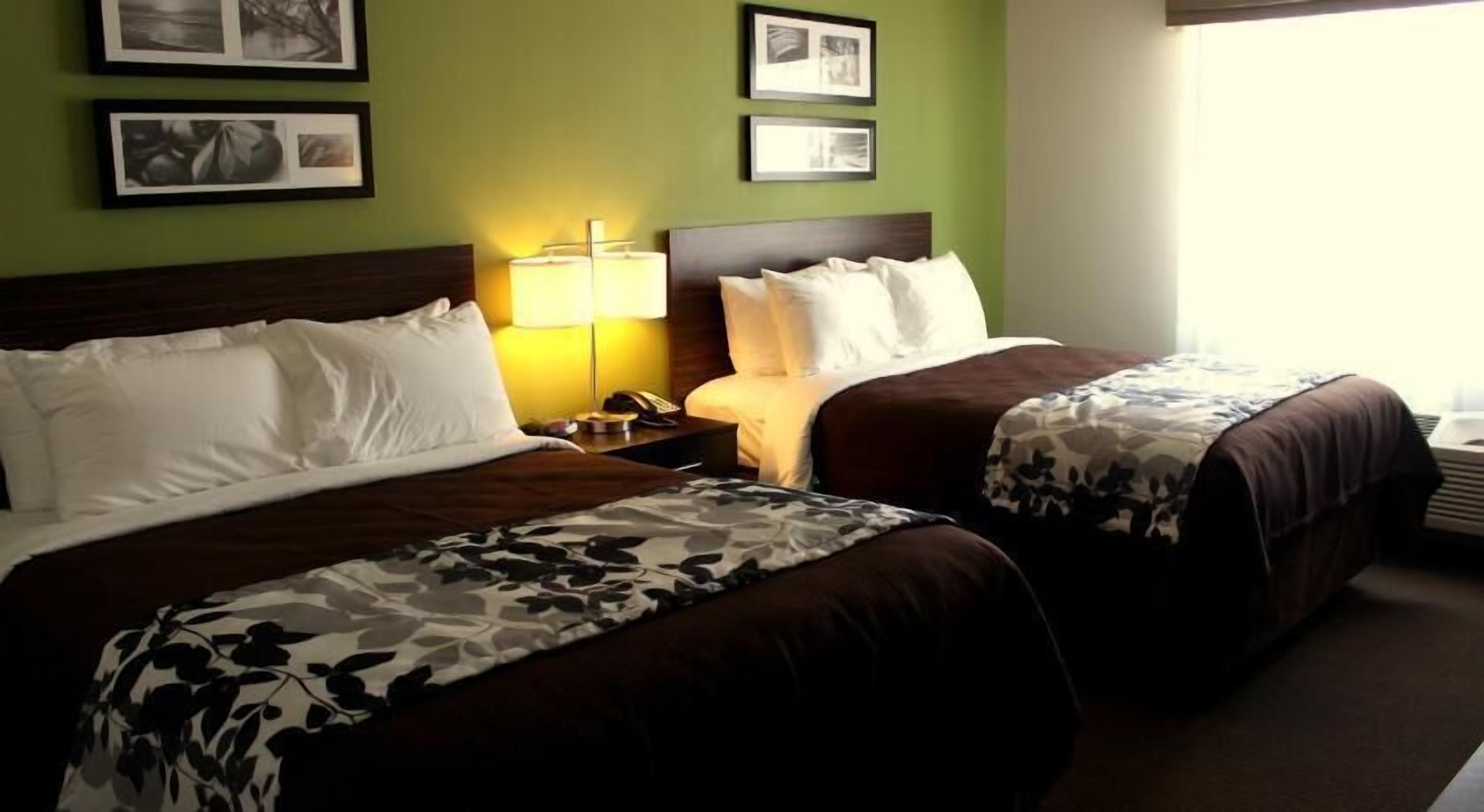 Desk, laptop workspace, blackout drapes, iron/ironing board