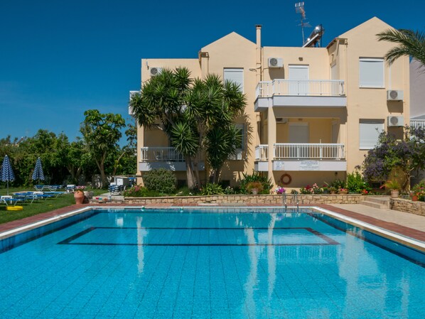Outdoor pool, pool umbrellas, pool loungers