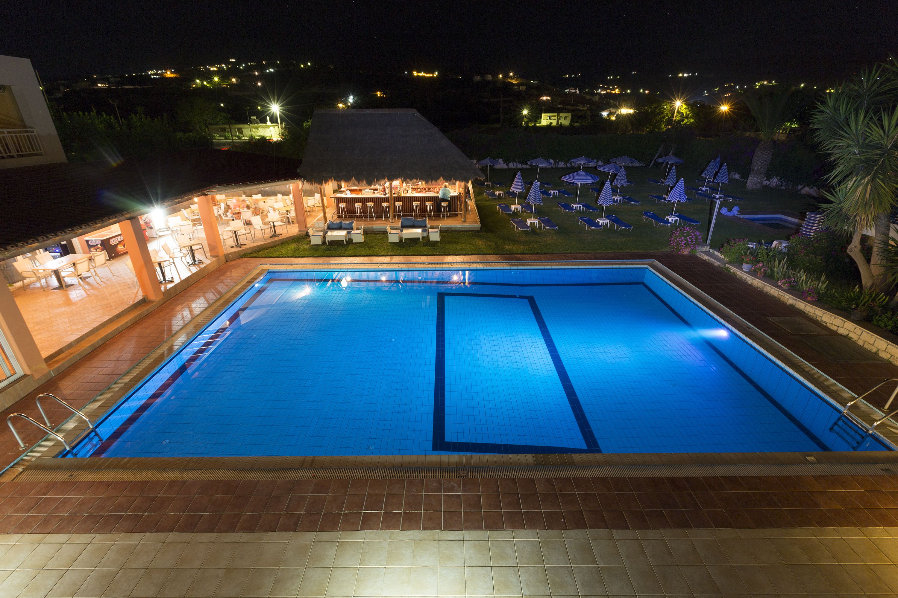 Outdoor pool, pool umbrellas, pool loungers