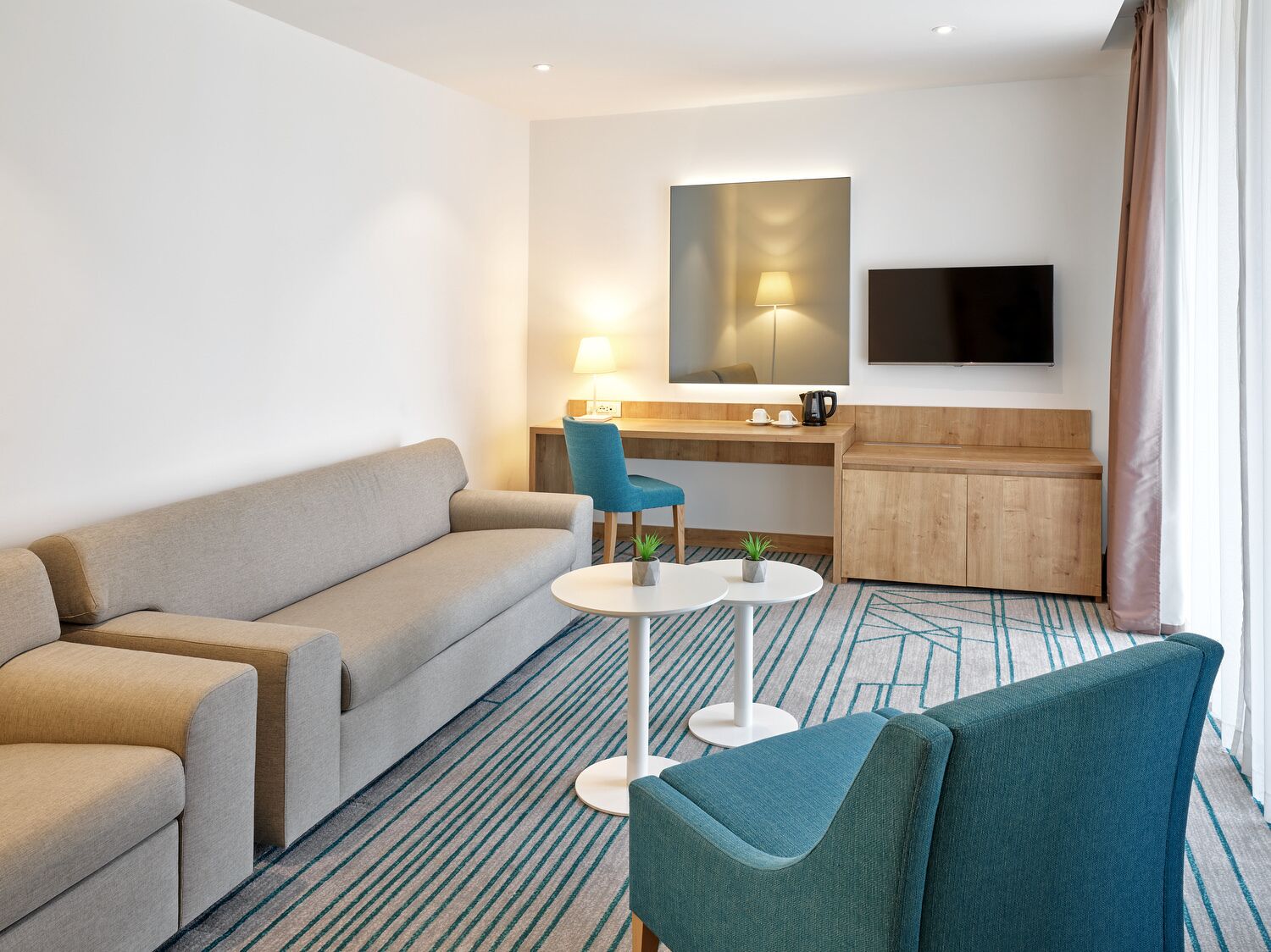 suite, balcony, sea view | living area | 40-inch lcd tv with satellite channels, smart tv