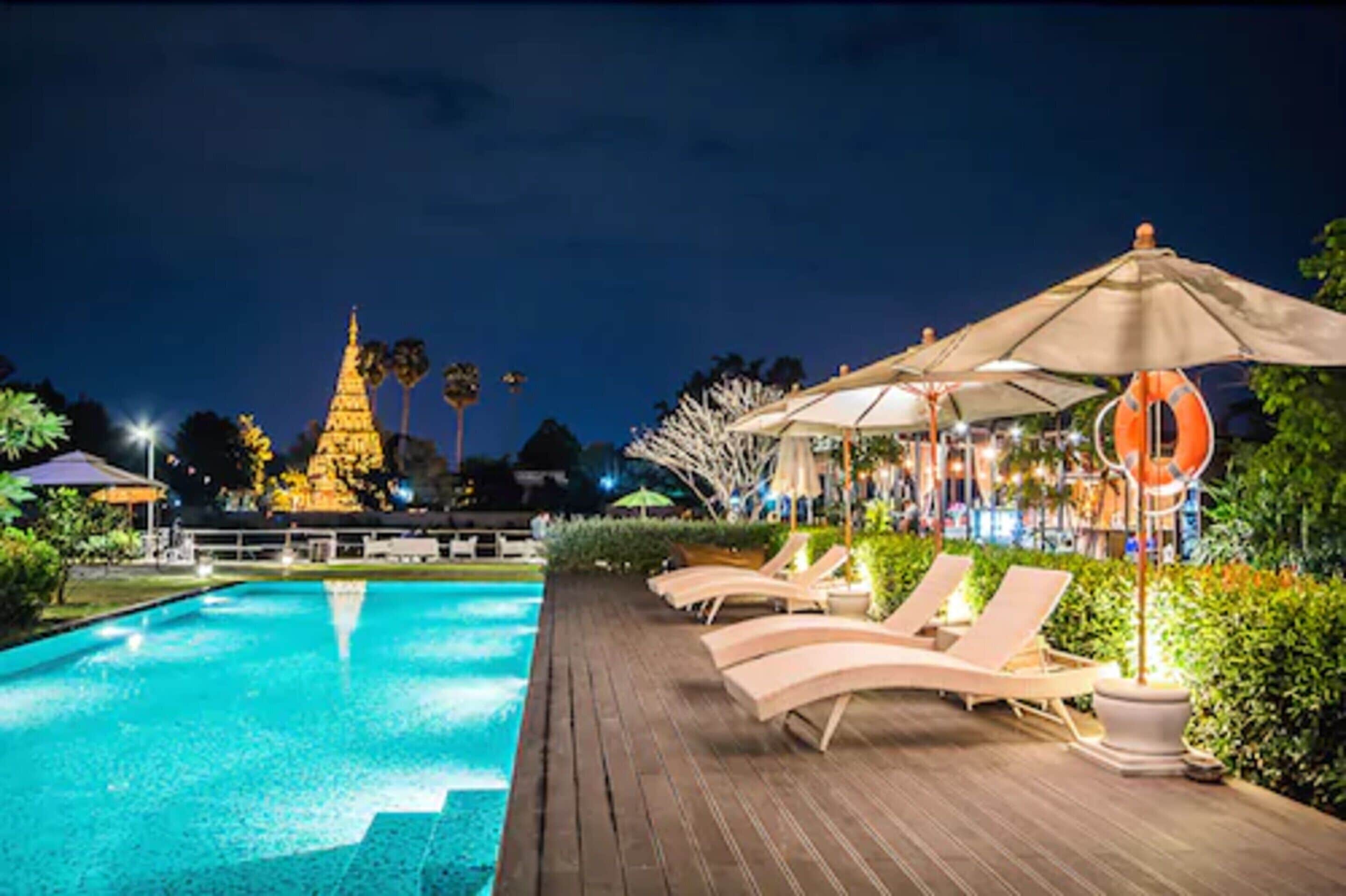 outdoor pool, open 10:00 am to 8:00 pm, pool umbrellas, pool loungers