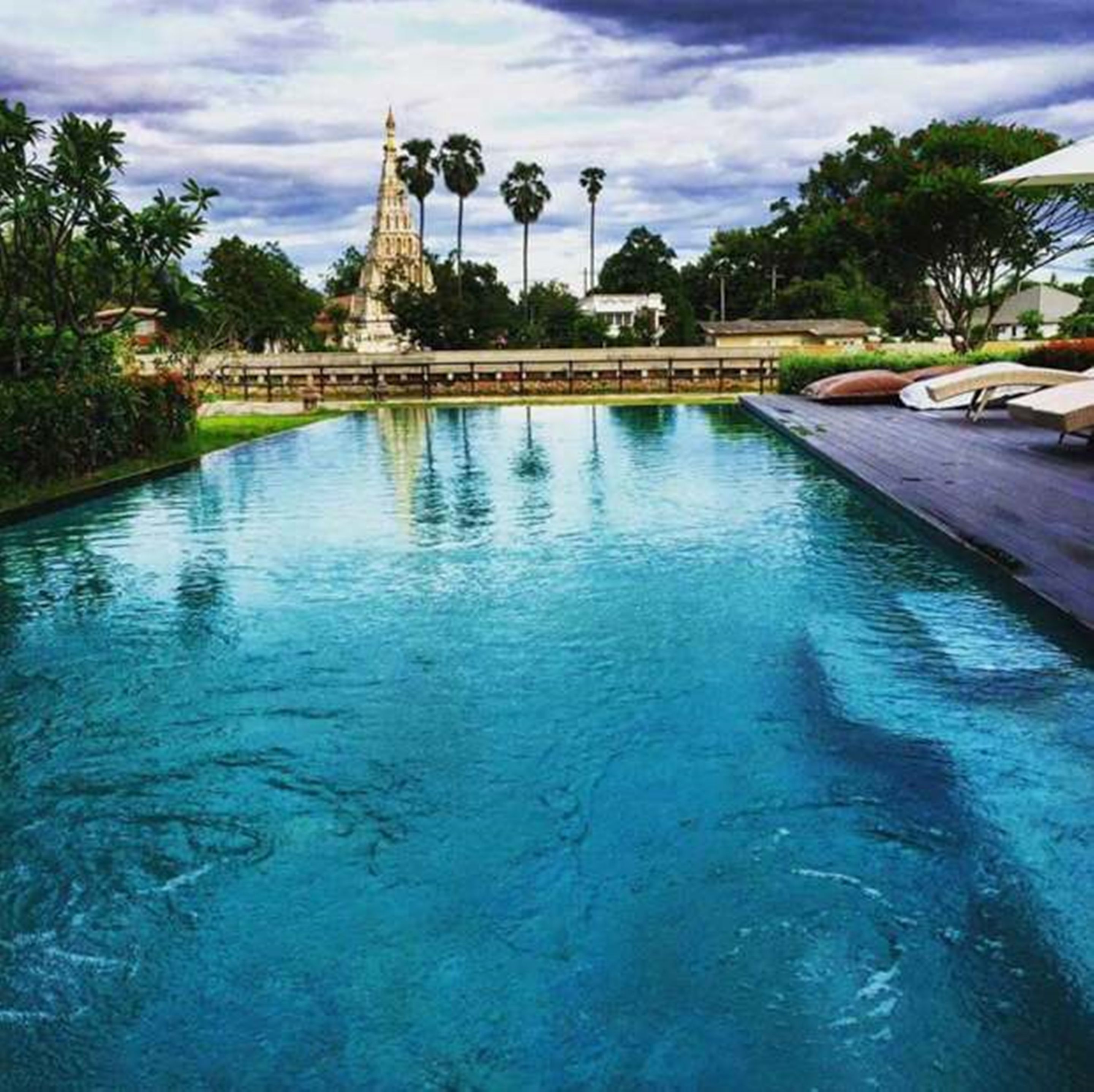 outdoor pool, open 10:00 am to 8:00 pm, pool umbrellas, pool loungers