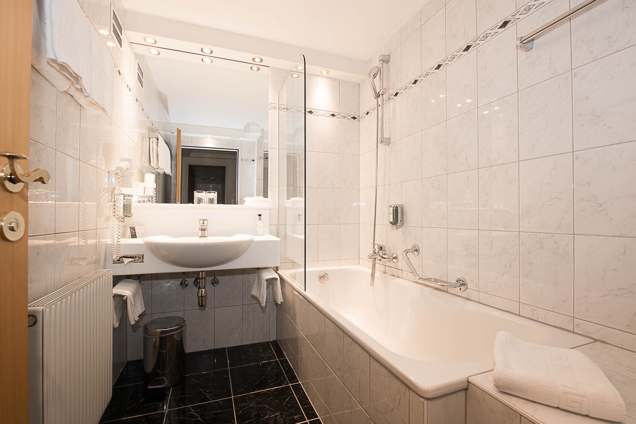 hair dryer, bathrobes, towels