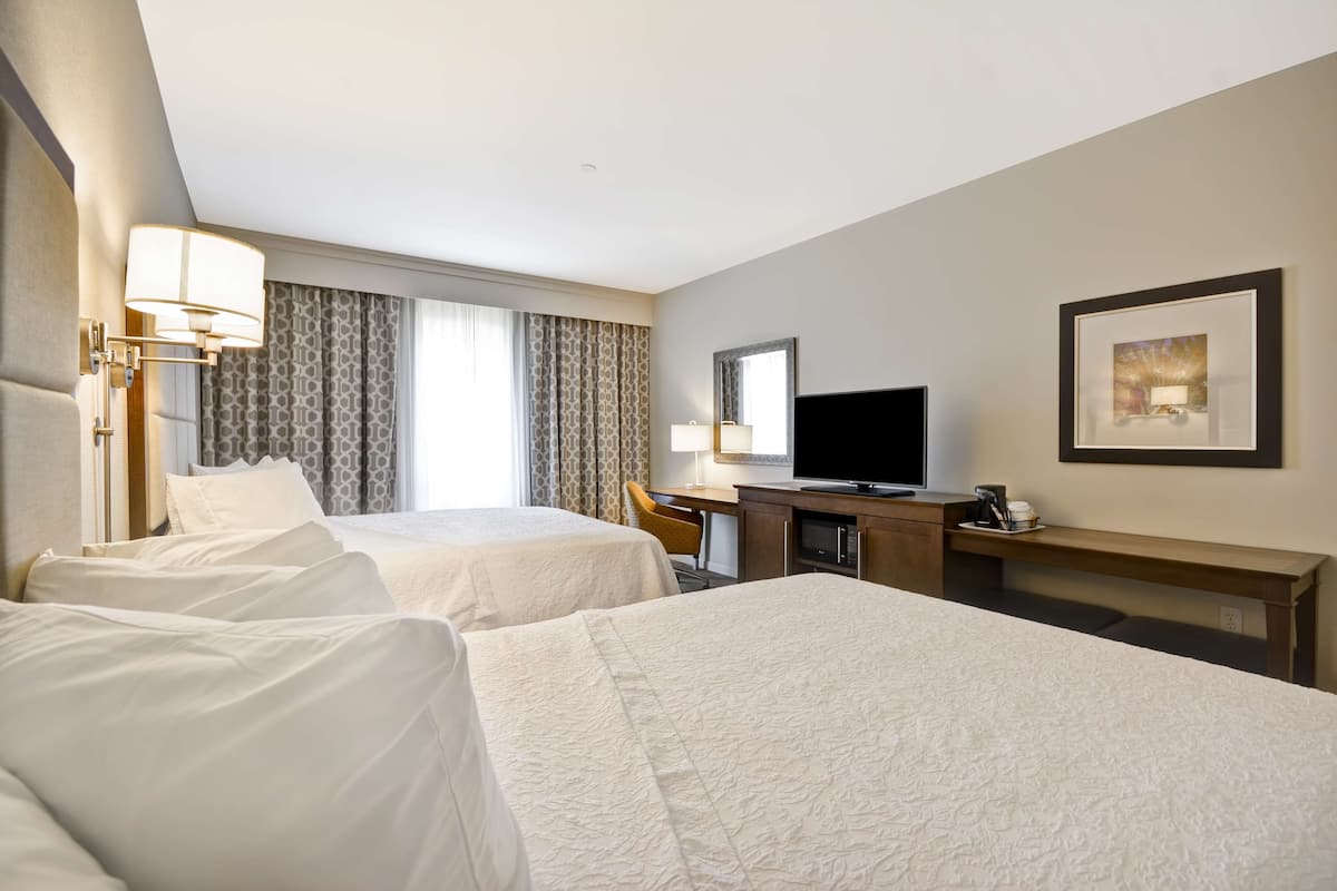 Room, 2 Queen Beds, Refrigerator & Microwave | Blackout curtains, free cots/infant beds, free WiFi, bed sheets