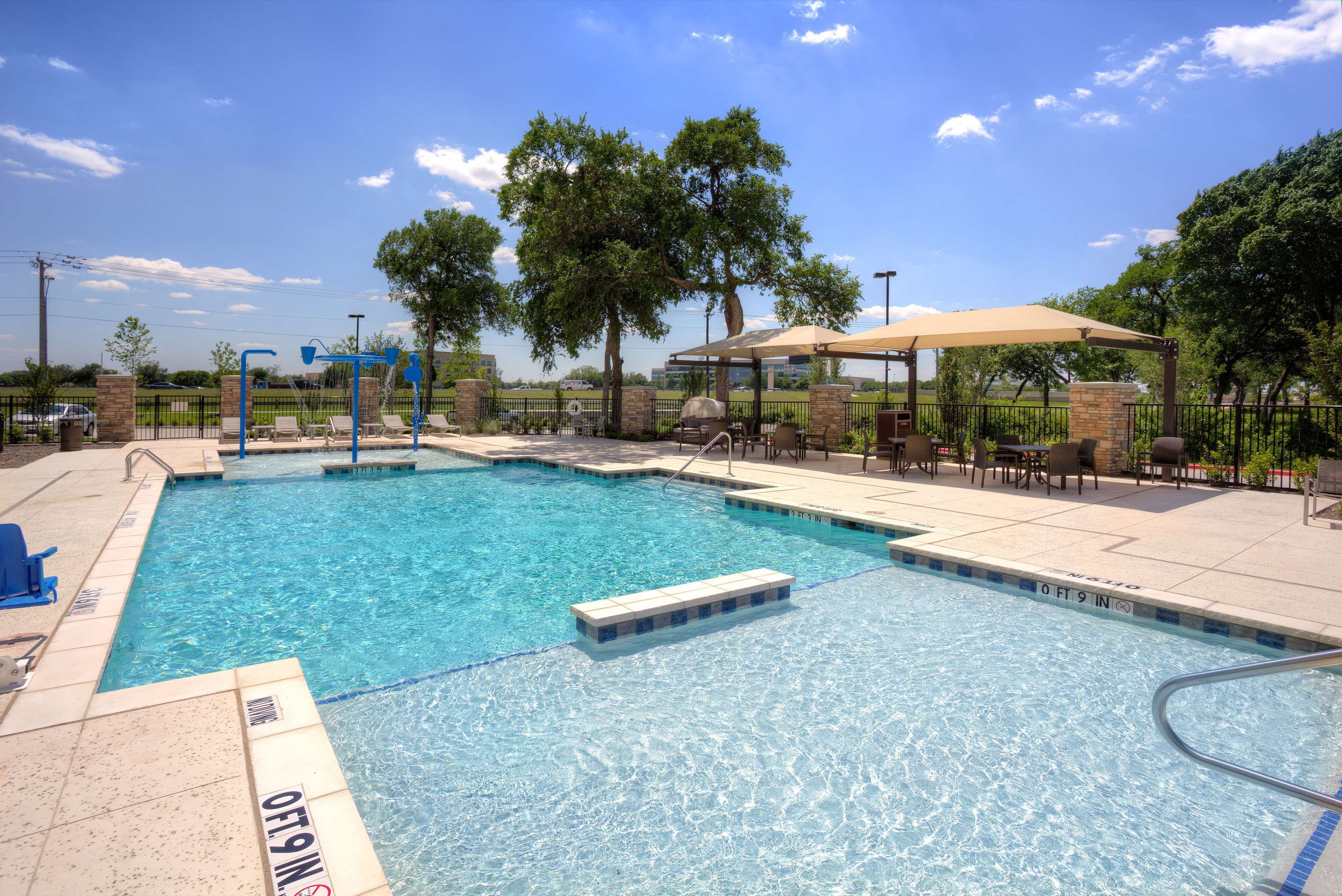 outdoor pool, open 9:00 am to 10:00 pm, pool umbrellas, pool loungers