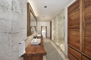 Shower, designer toiletries, hair dryer, bathrobes