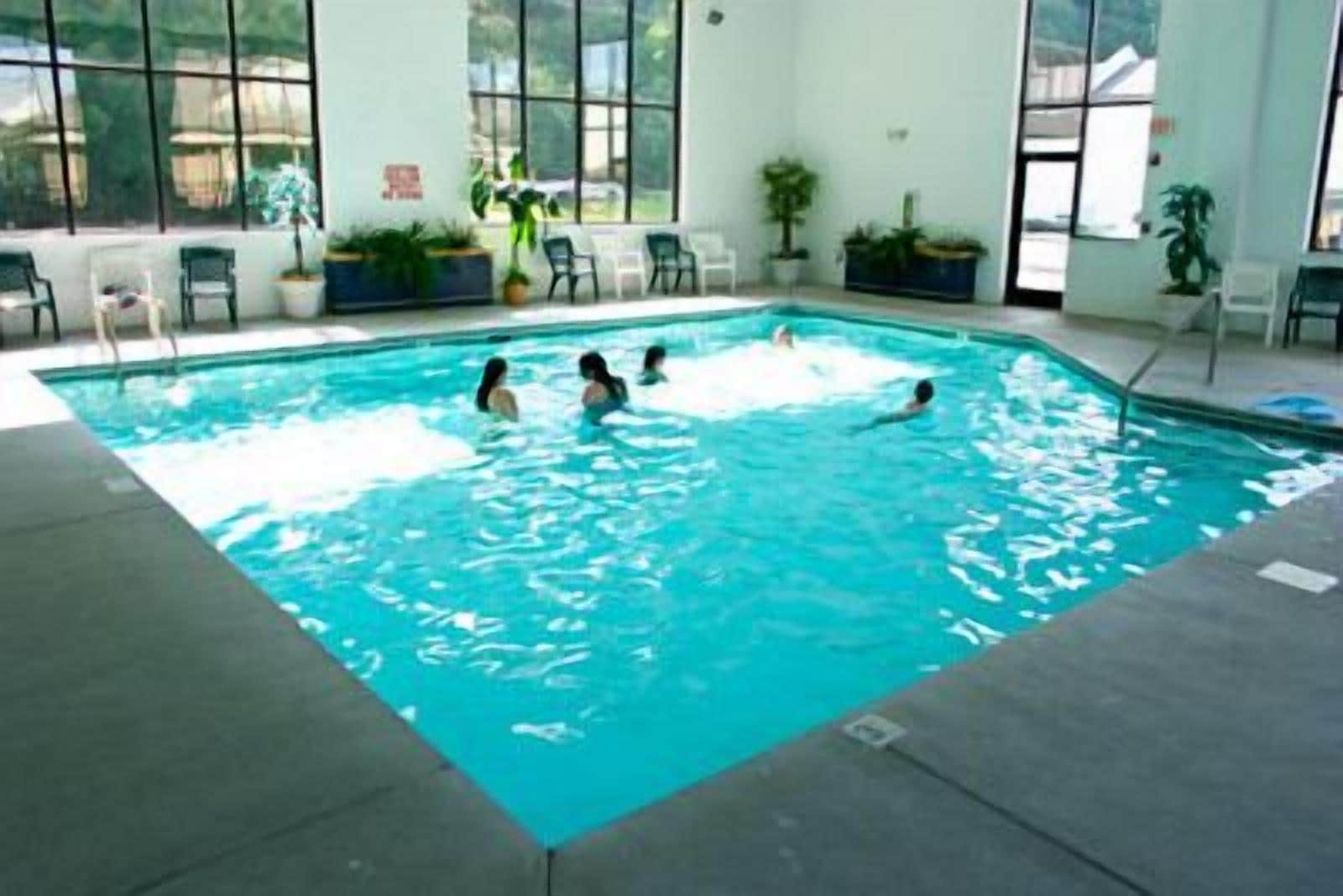 indoor pool, outdoor pool, pool loungers