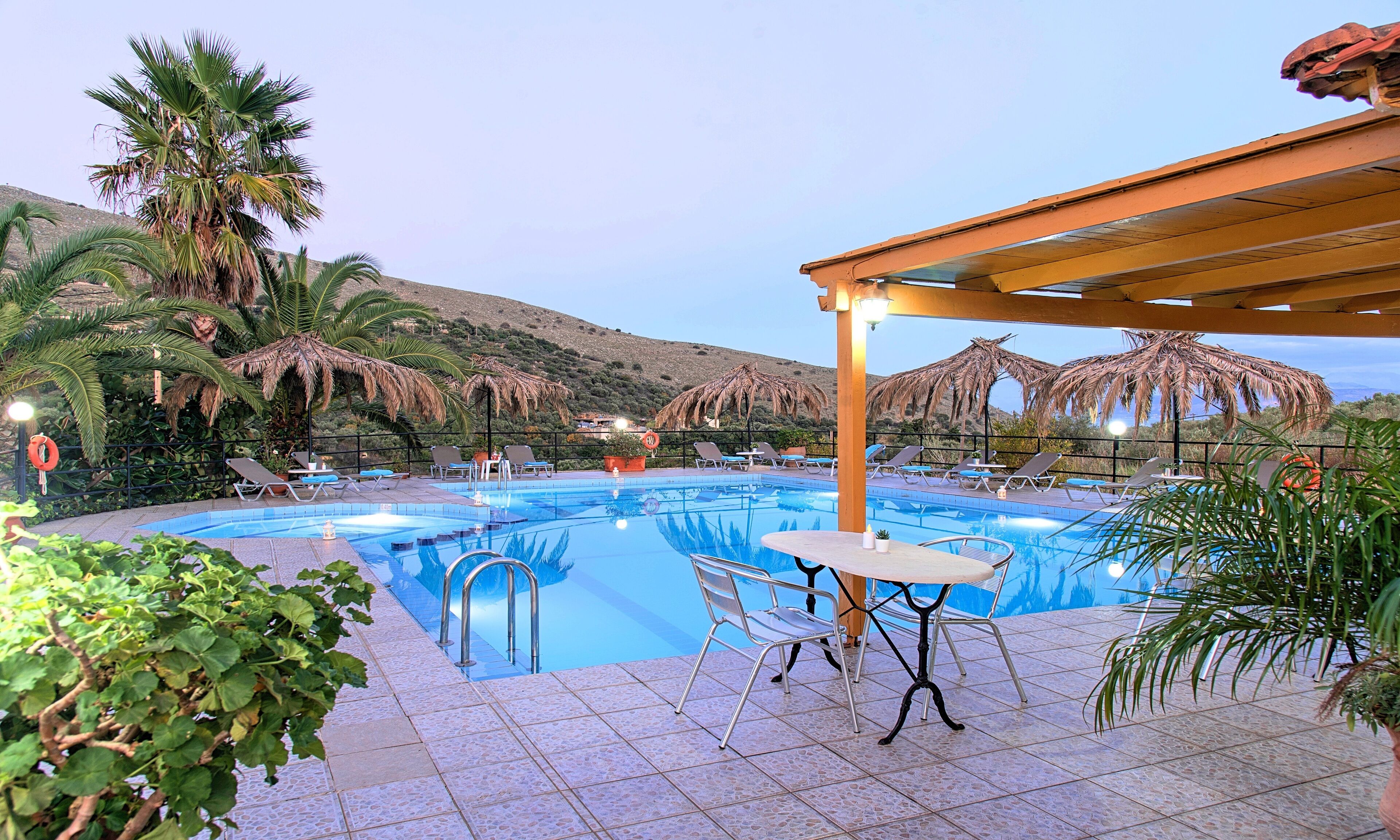seasonal outdoor pool, pool umbrellas, pool loungers