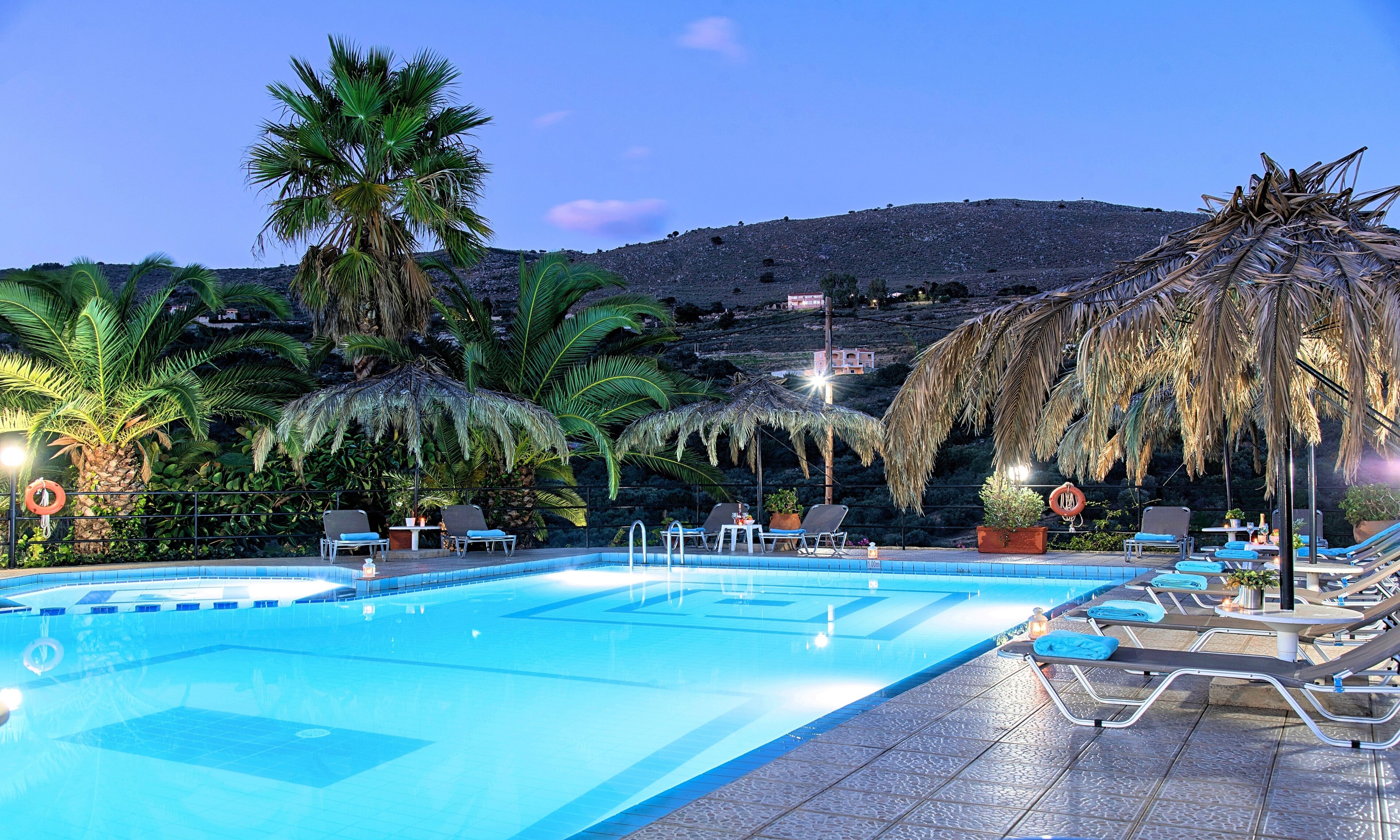 seasonal outdoor pool, pool umbrellas, pool loungers