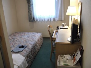 Desk, blackout curtains, free WiFi, bed sheets