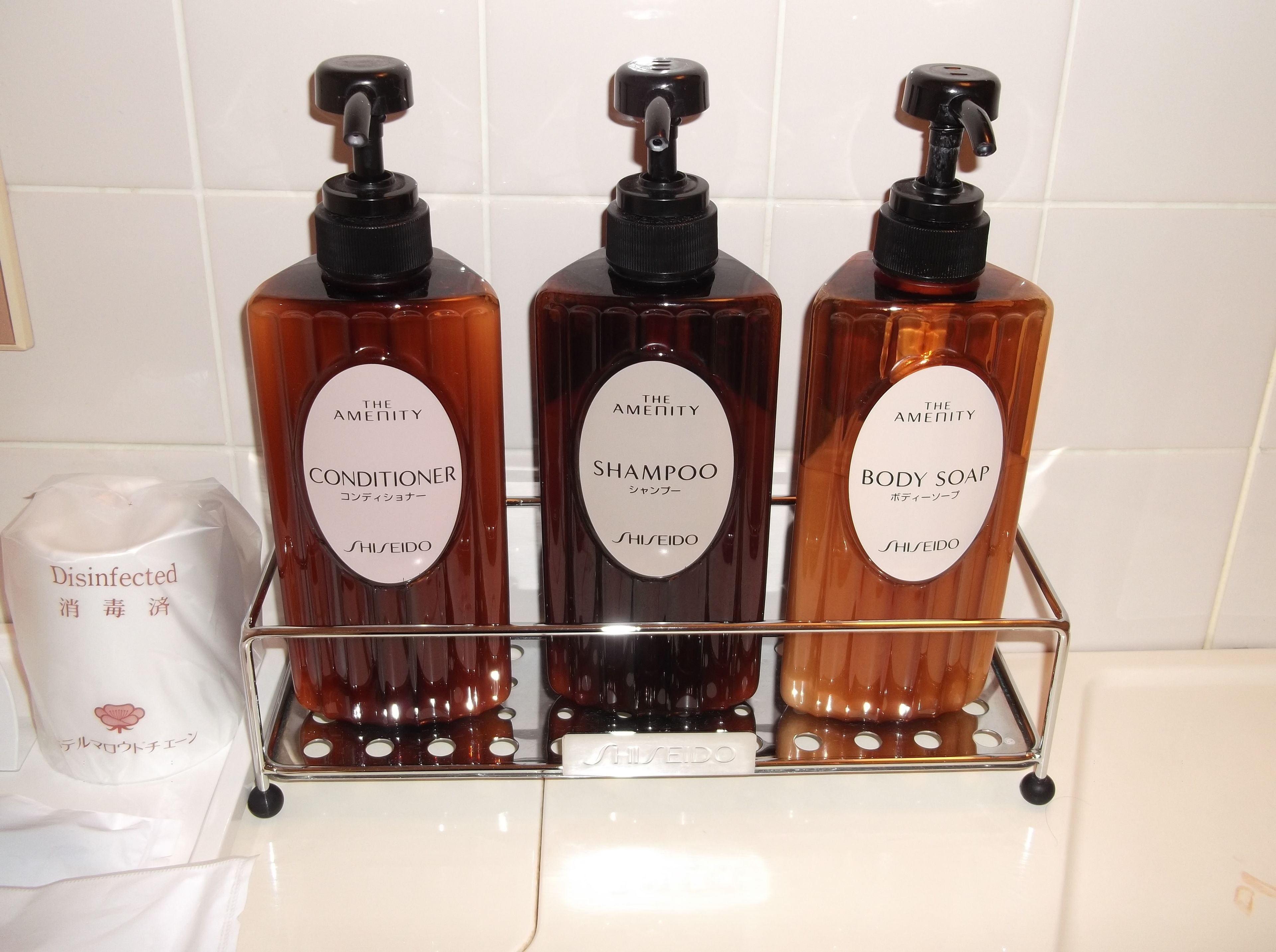 Combined shower/tub, free toiletries, hair dryer, slippers