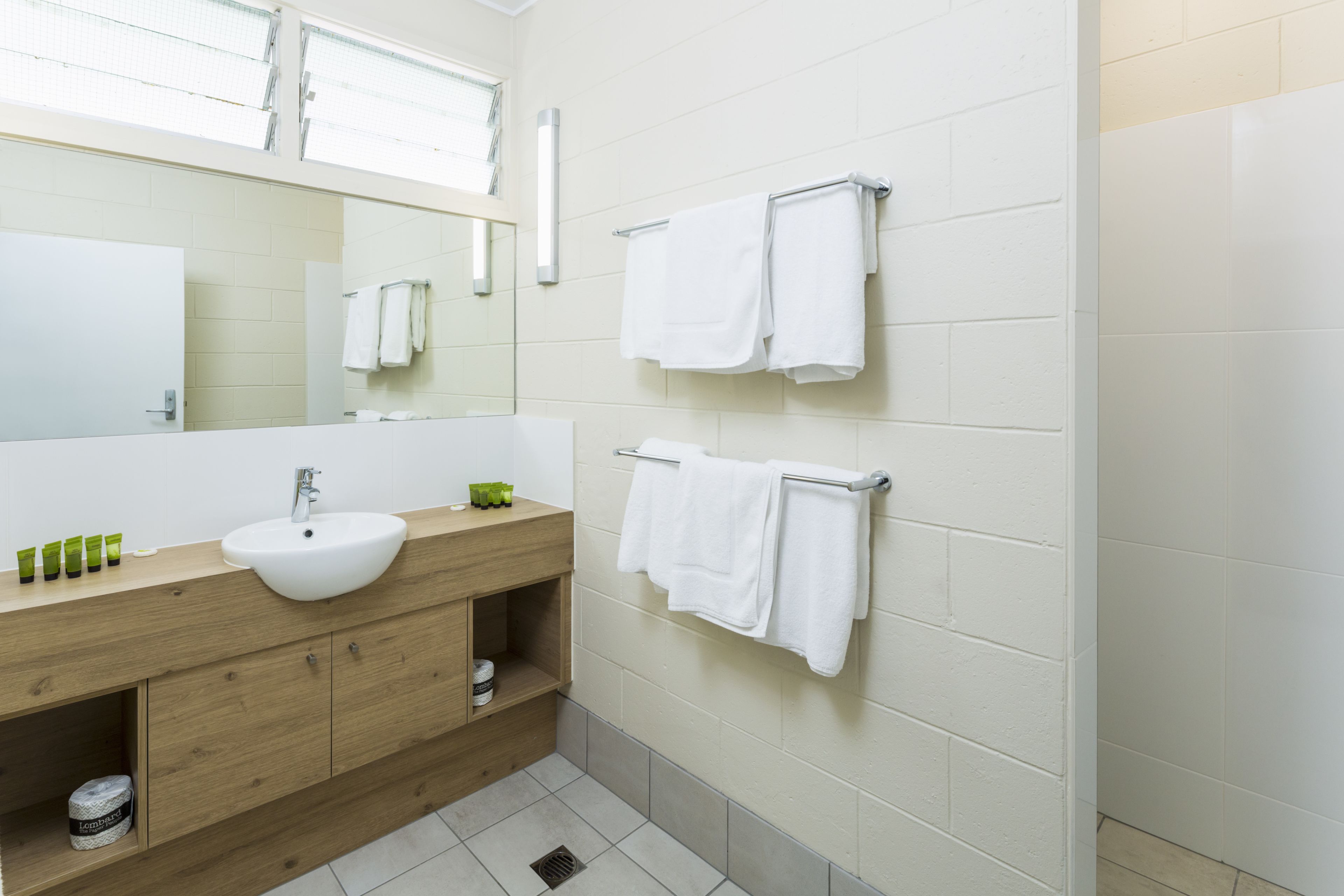 three bedroom apartment | bathroom | shower, rainfall showerhead, free toiletries, hair dryer