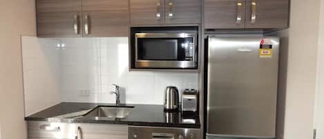 Appartement Deluxe, 2 chambres, cuisine | Bureau, lits pliants/supplémentaires, Wi-Fi gratuit, draps fournis