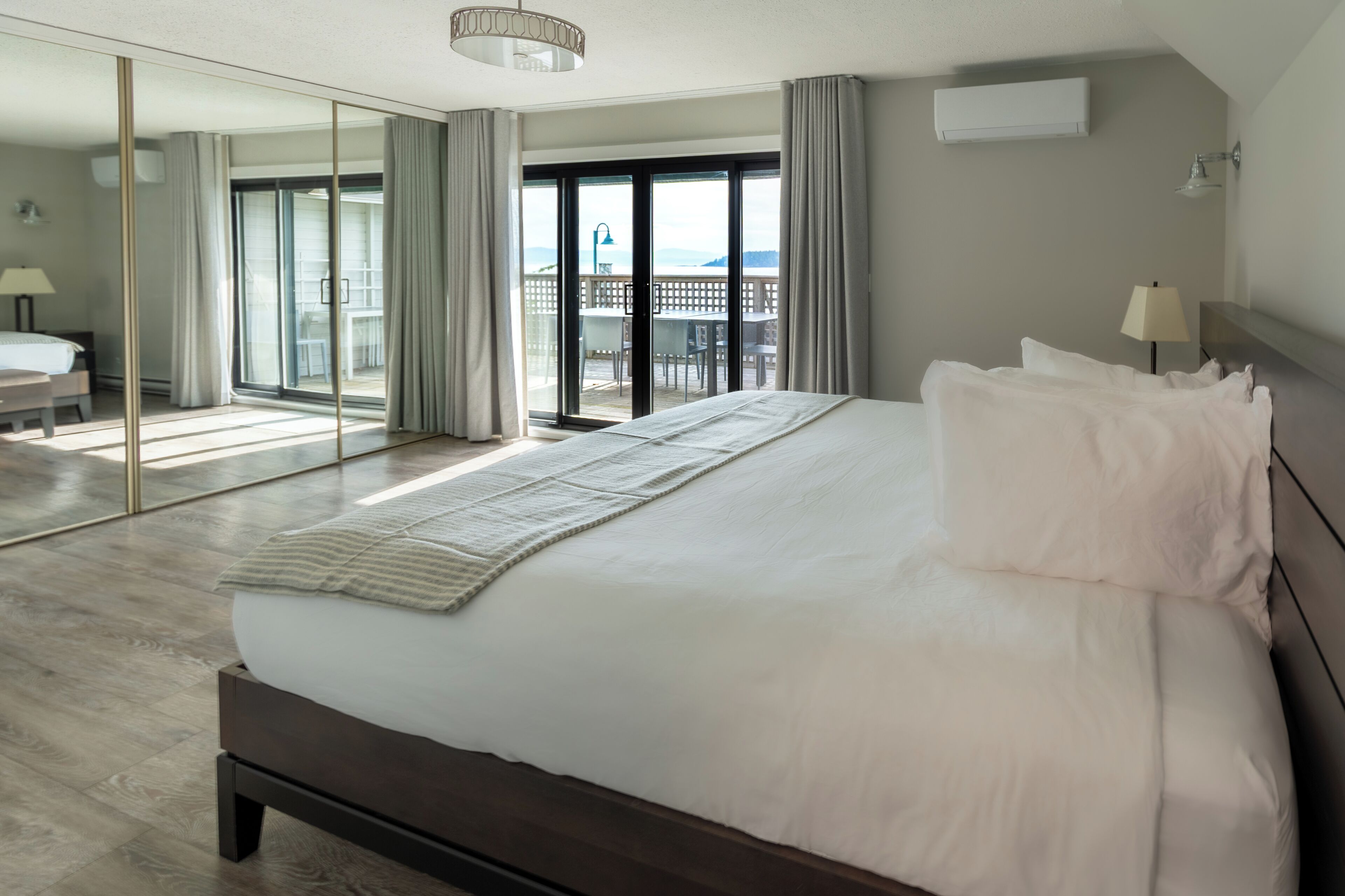 Deluxe Penthouse, Multiple Beds, Kitchen, Ocean View | Desk, laptop workspace, iron/ironing board, travel crib