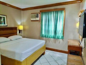 Economy Room | Living area | TV - Nature's Pensionne House (Cagayan de Oro)