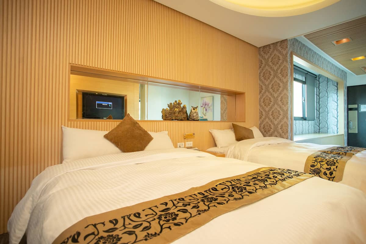 standard quadruple room | in-room safe, soundproofing, free wifi, bed sheets