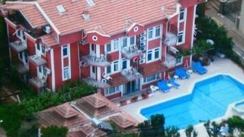 Outdoor pool, pool umbrellas, pool loungers