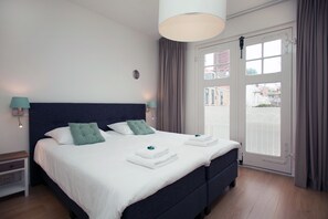 Apartamento, 1 quarto (splitlevel) | Ferros/tábuas de passar roupa, berços grátis, Wi-Fi de cortesia