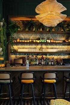 3 bars/lounges, poolside bar, beach bar at The Island House
