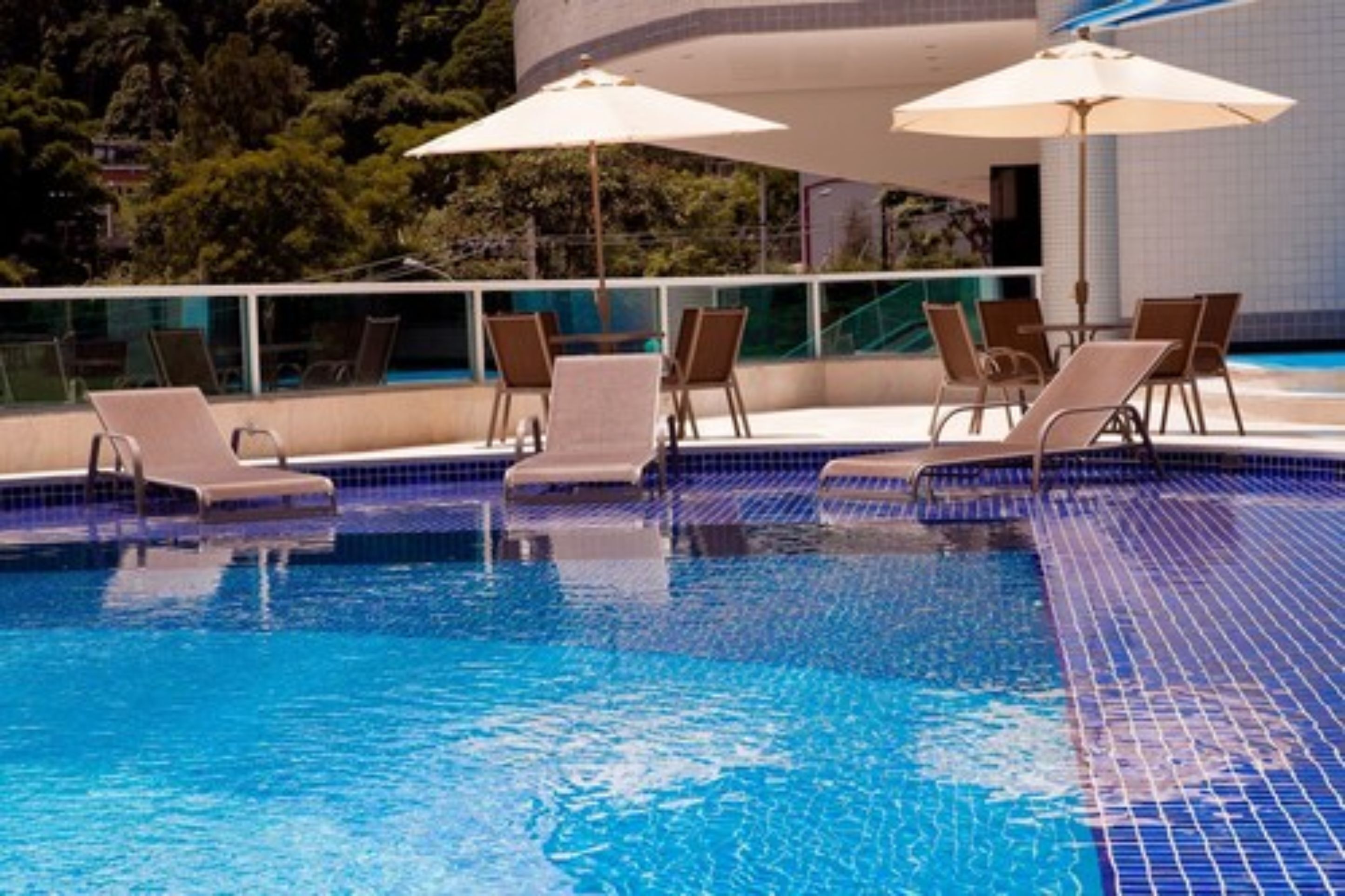 outdoor pool, open 8 am to 9:00 pm, pool loungers