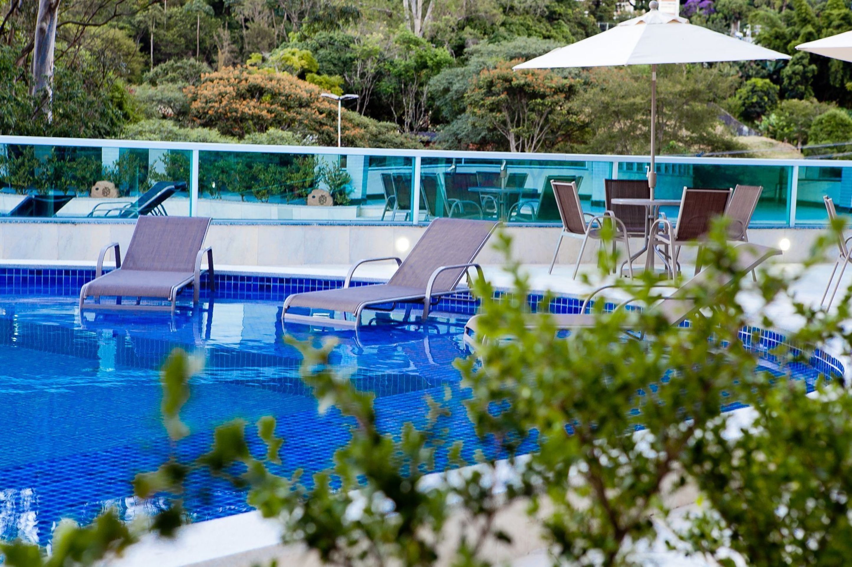 outdoor pool, open 8 am to 9:00 pm, pool loungers