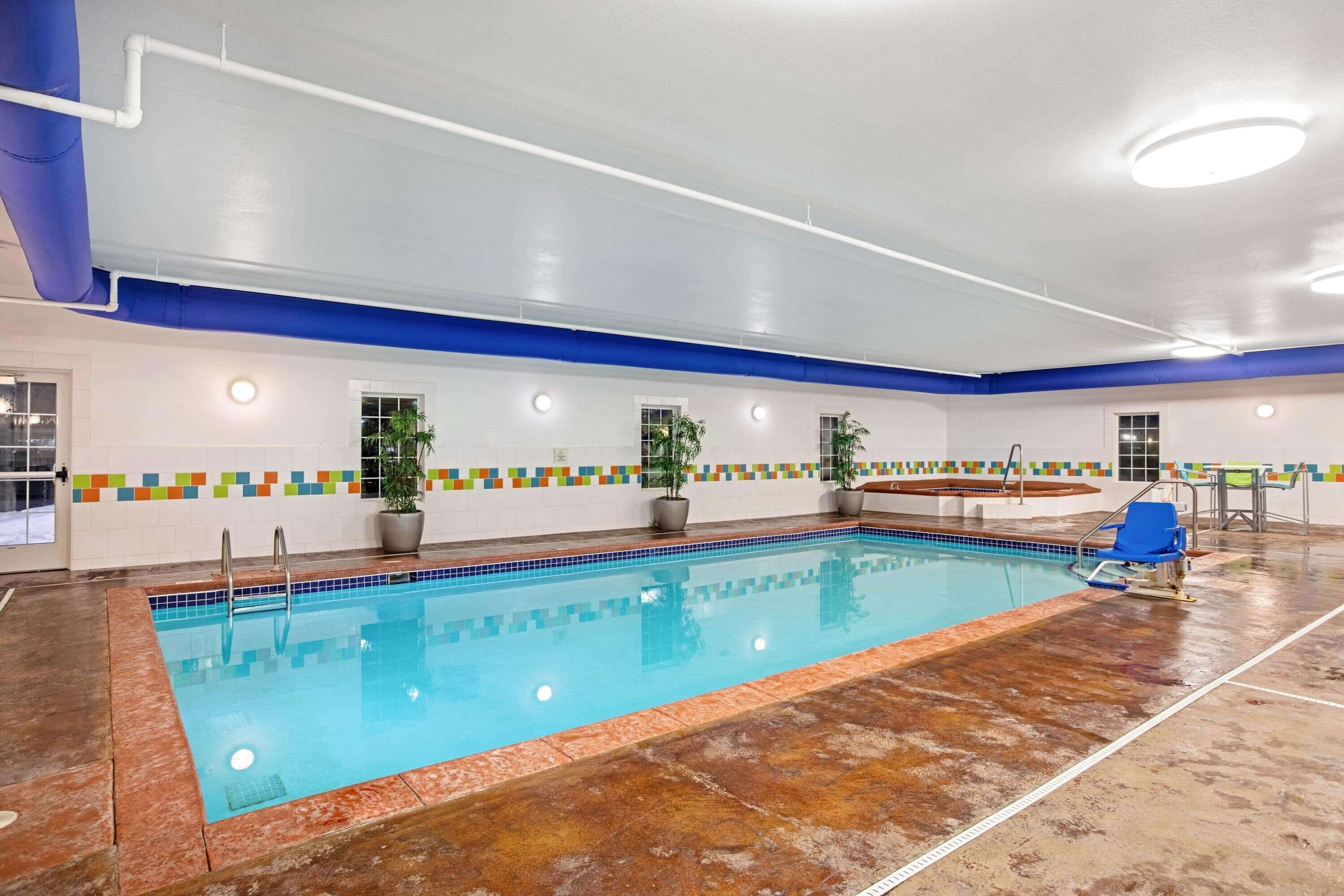 indoor pool, open 7:00 am to 11:00 pm, pool loungers