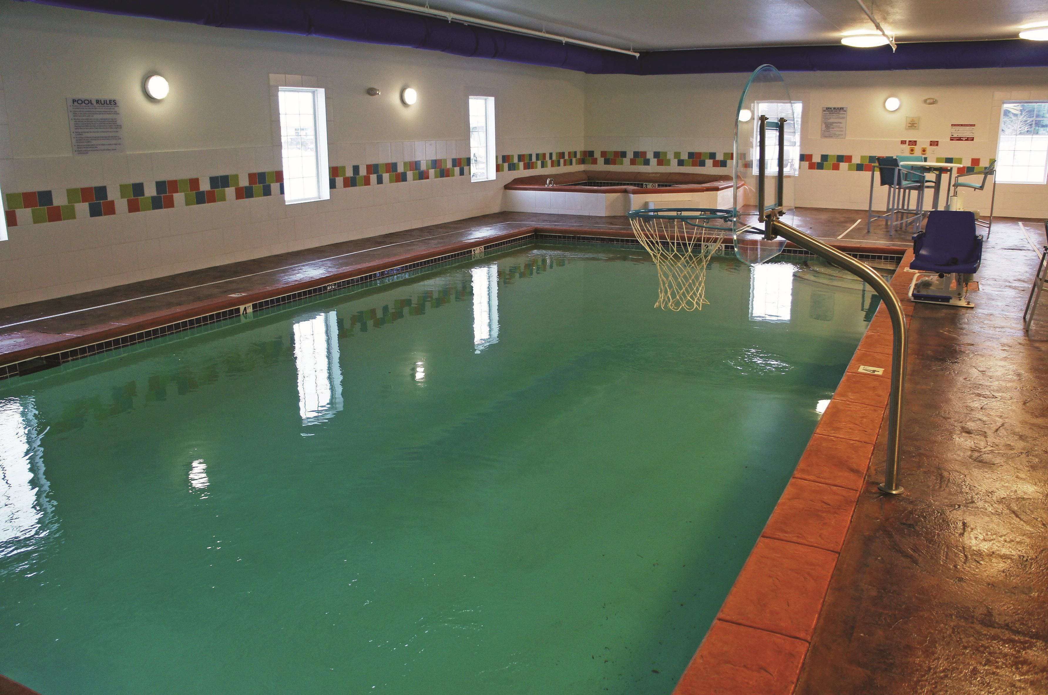 indoor pool, open 7:00 am to 11:00 pm, pool loungers