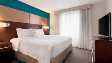 Down duvets, desk, laptop workspace, blackout curtains