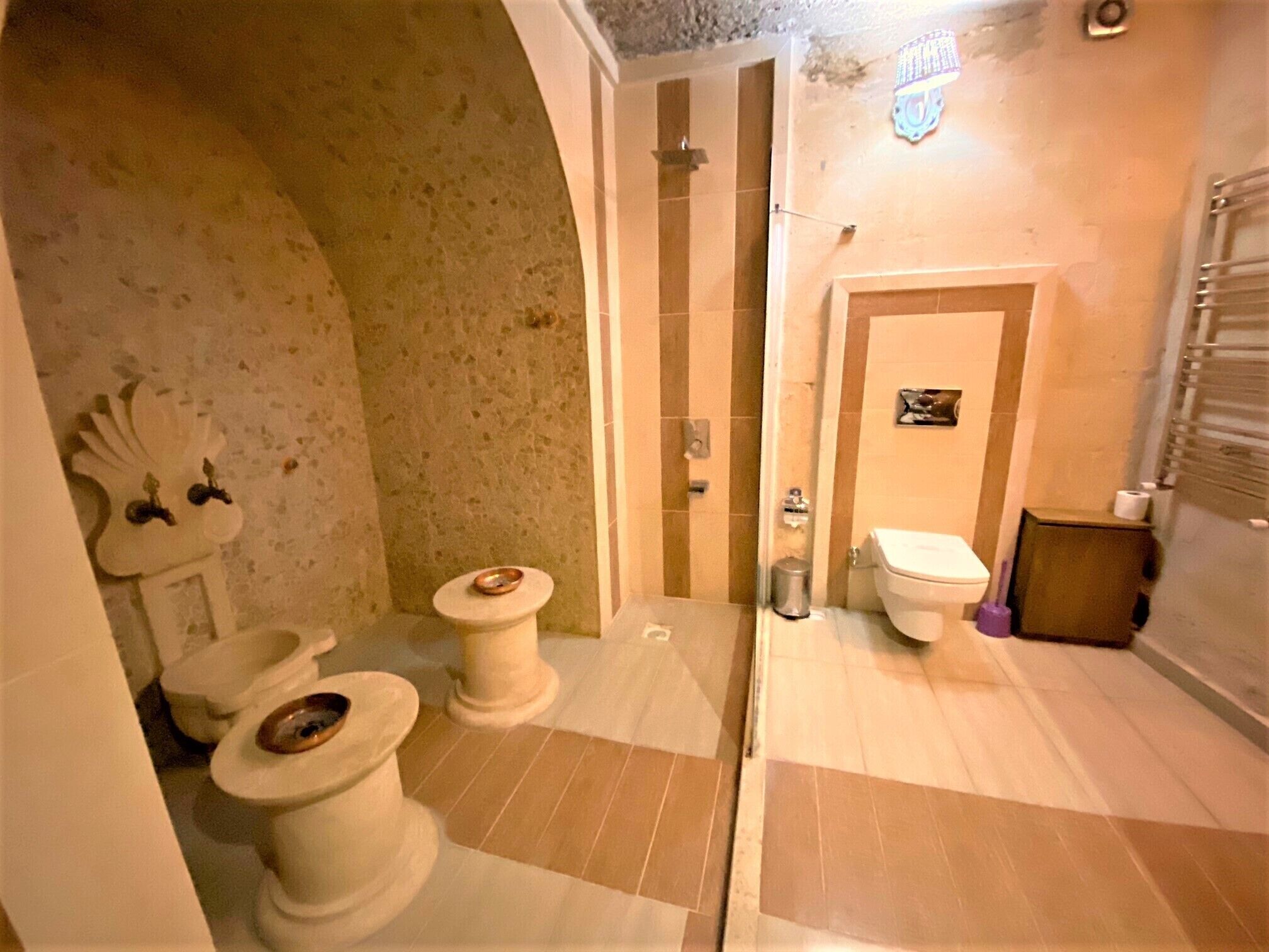 junior cave suite with turkish bath | bathroom | free toiletries, hair dryer, slippers, towels
