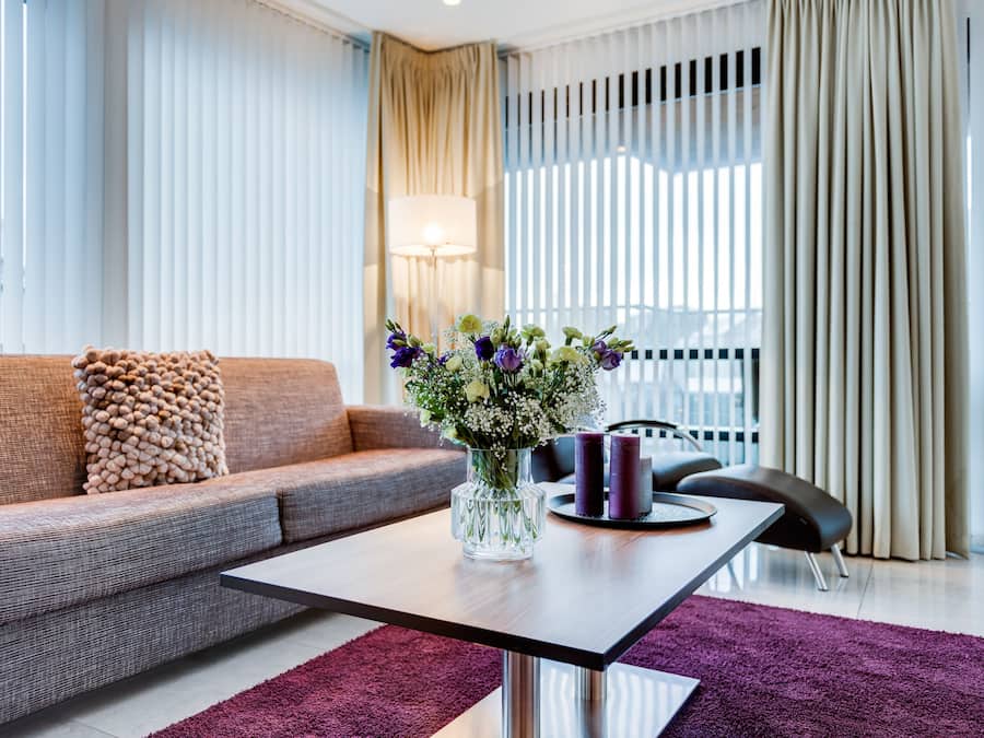 Deluxe Suite, 1 Bedroom, Balcony | Living area