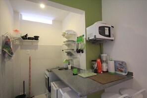 Apartment, 1 Bedroom | Private kitchenette | Full-sized fridge, microwave, stovetop, cookware/dishes/utensils - GoHouse Copacabana 1005 A (Rio de Janeiro)