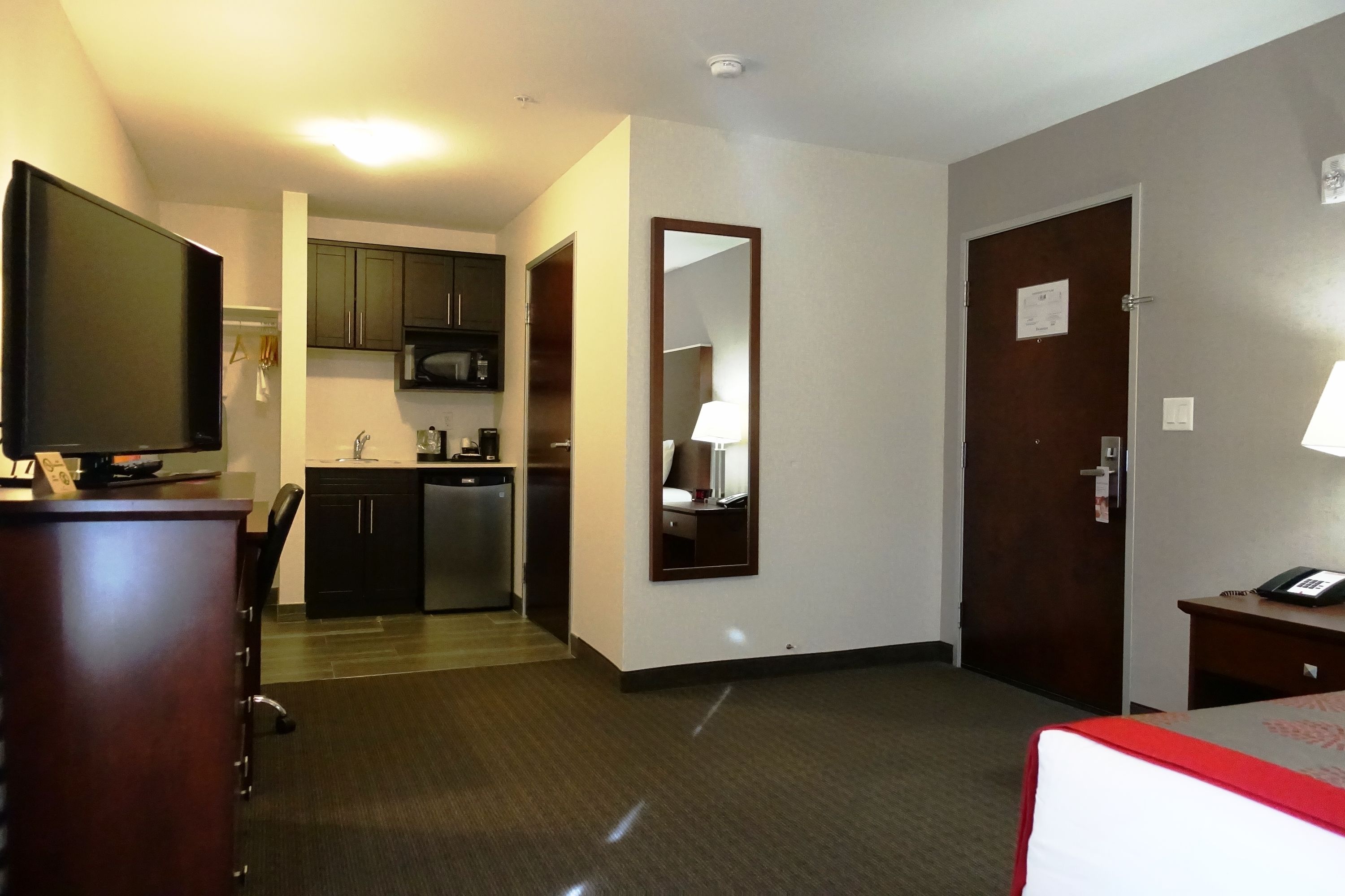 desk, laptop workspace, blackout curtains, iron/ironing board