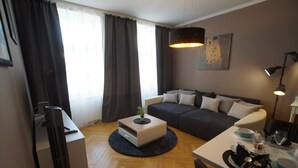 Design apartman | Nappalirész | LED-tévé
