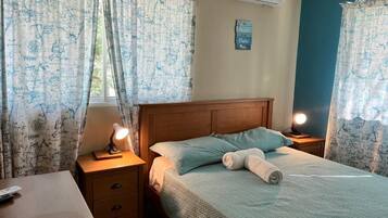 Economy Room | In-room safe, iron/ironing board, free WiFi, bed sheets
