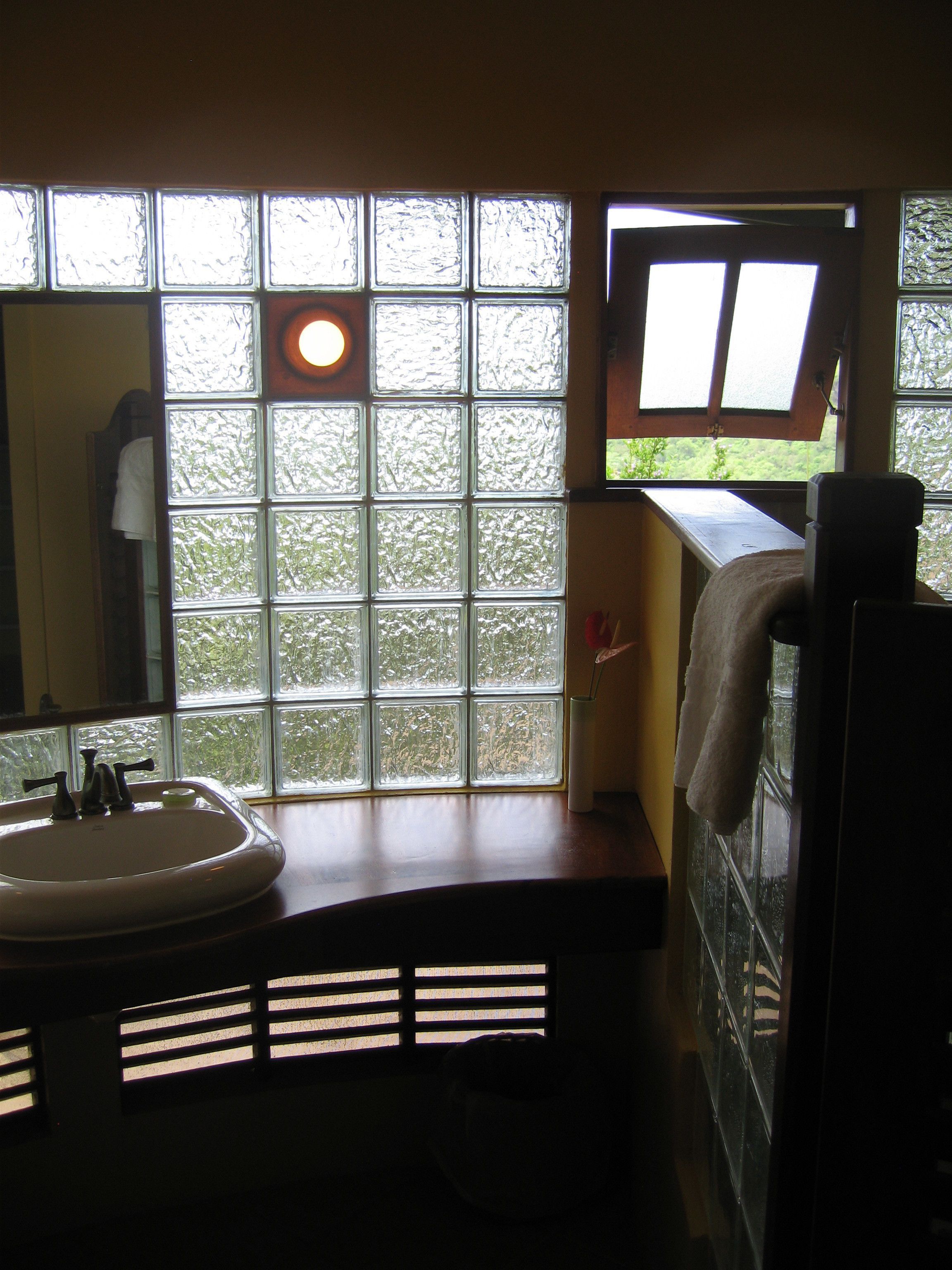 suite (king bed) | bathroom | shower, hair dryer, towels