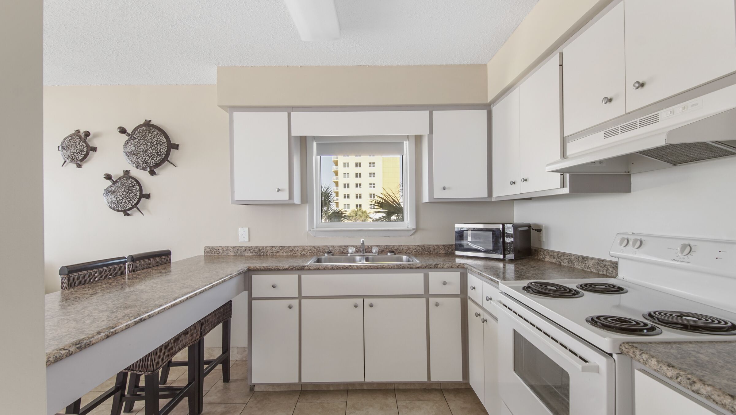 family suite, 1 bedroom, balcony, beach view | 1 bedroom, laptop workspace, iron/ironing board, cots/infant beds