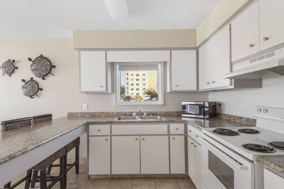 family suite, 1 bedroom, balcony, beach view | 1 bedroom, laptop workspace, iron/ironing board, cots/infant beds