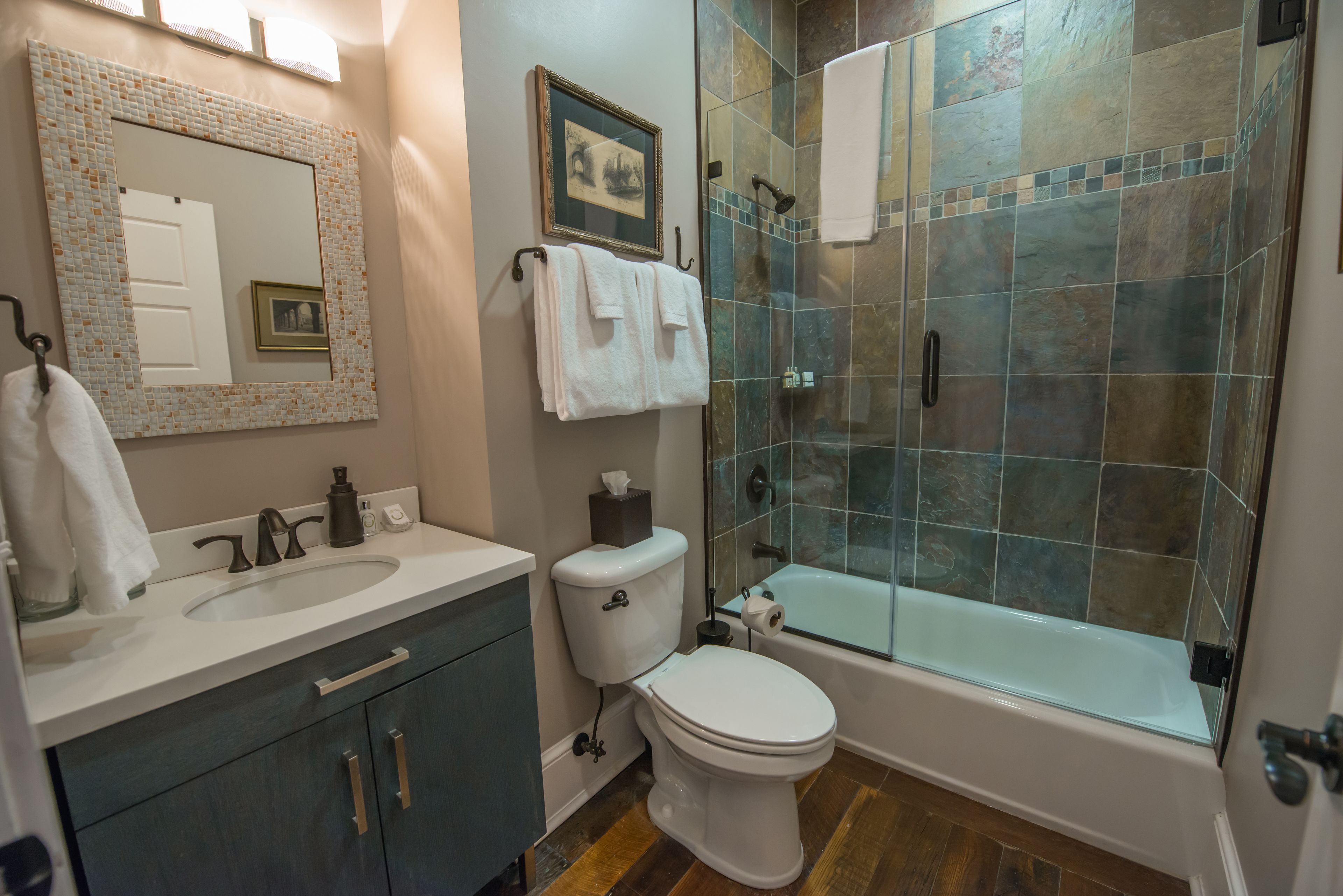 luxury suite, 1 king bed | bathroom | designer toiletries, hair dryer, bathrobes, slippers