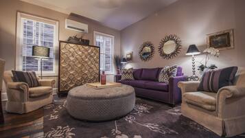 Executive Suite, 1 King Bed | Living area | 50-inch flat-screen TV with digital channels, TV, DVD player
