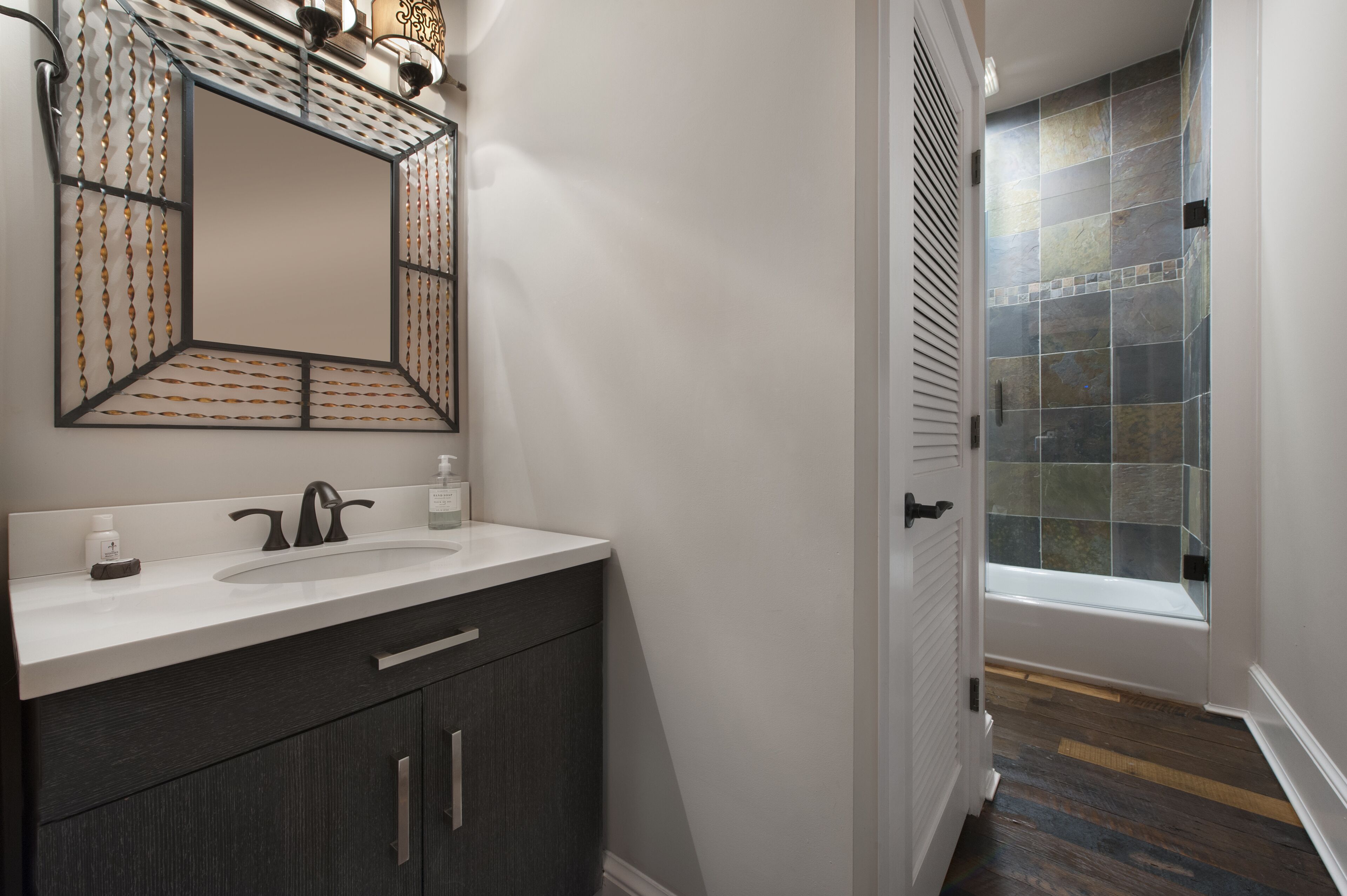 luxury suite, 1 queen bed | bathroom | designer toiletries, hair dryer, bathrobes, slippers