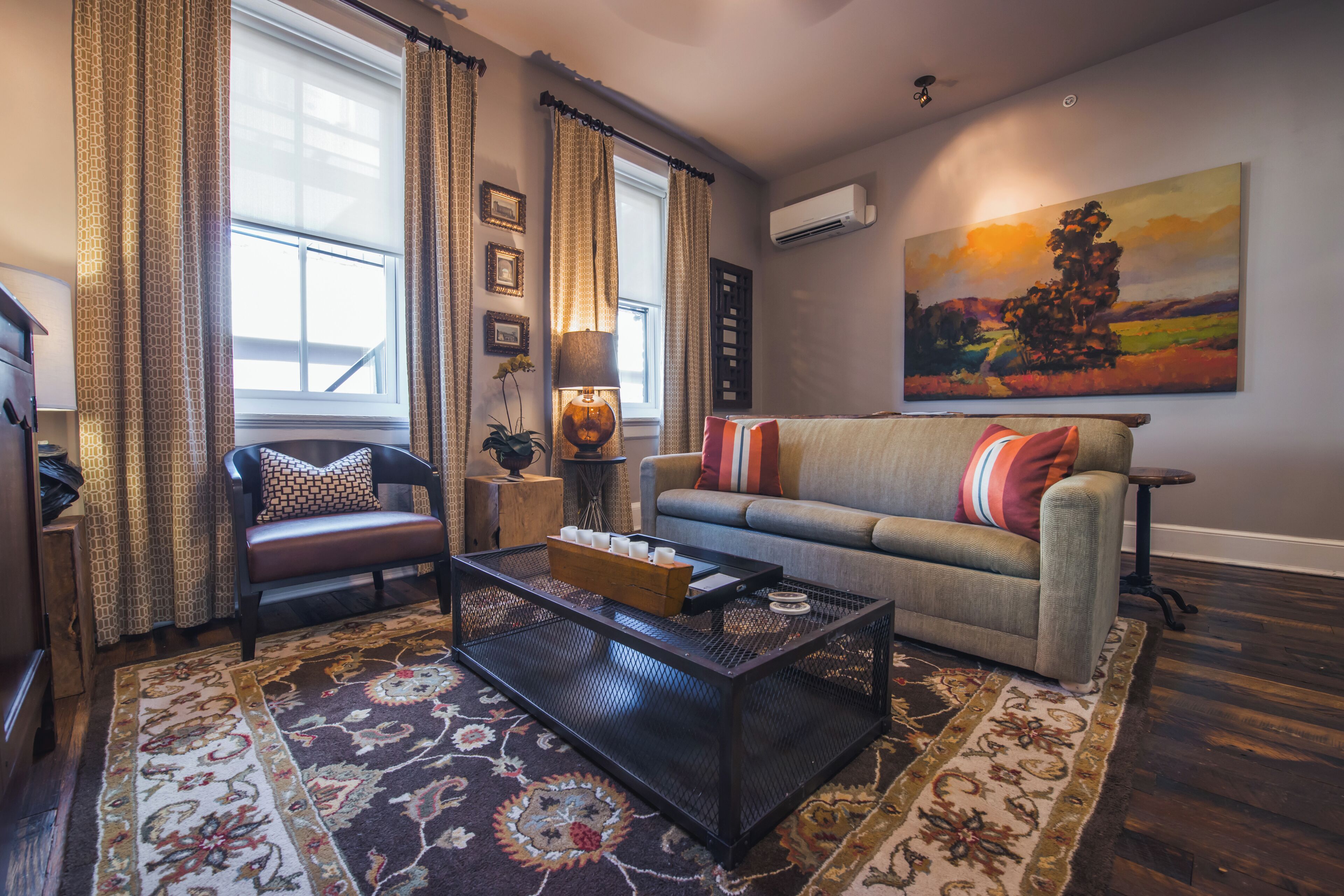 luxury suite, 2 queen beds | living area | 50-inch flat-screen tv with digital channels, tv, dvd player