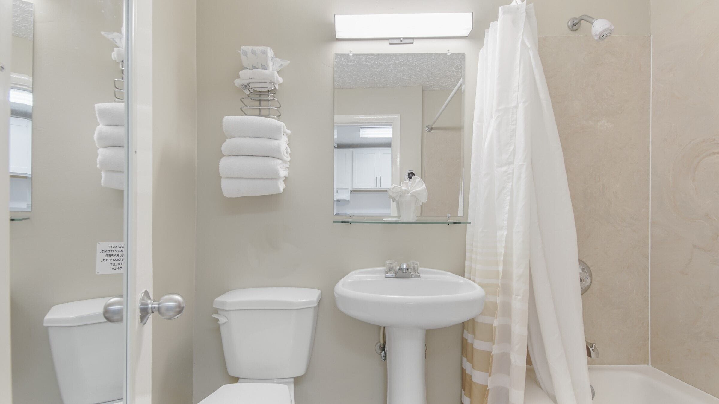 comfort studio, 1 king bed with sofa bed, kitchen, beach view | bathroom | combined shower/bathtub, hair dryer, towels, soap