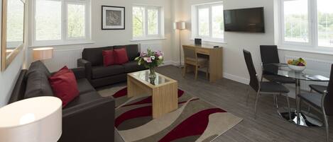 Luxury Apartment, 2 Bedrooms | Living area | 55-inch Smart TV with digital channels, Netflix, streaming services