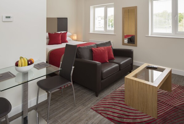 Deluxe Studio, 1 Double Bed | Living area | 55-inch Smart TV with digital channels, Netflix, streaming services - Beneficial House by House of Fisher (Bracknell)