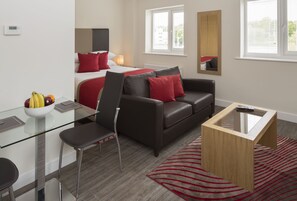 Deluxe Studio, 1 Double Bed | Living area | 55-inch Smart TV with digital channels, Netflix, streaming services