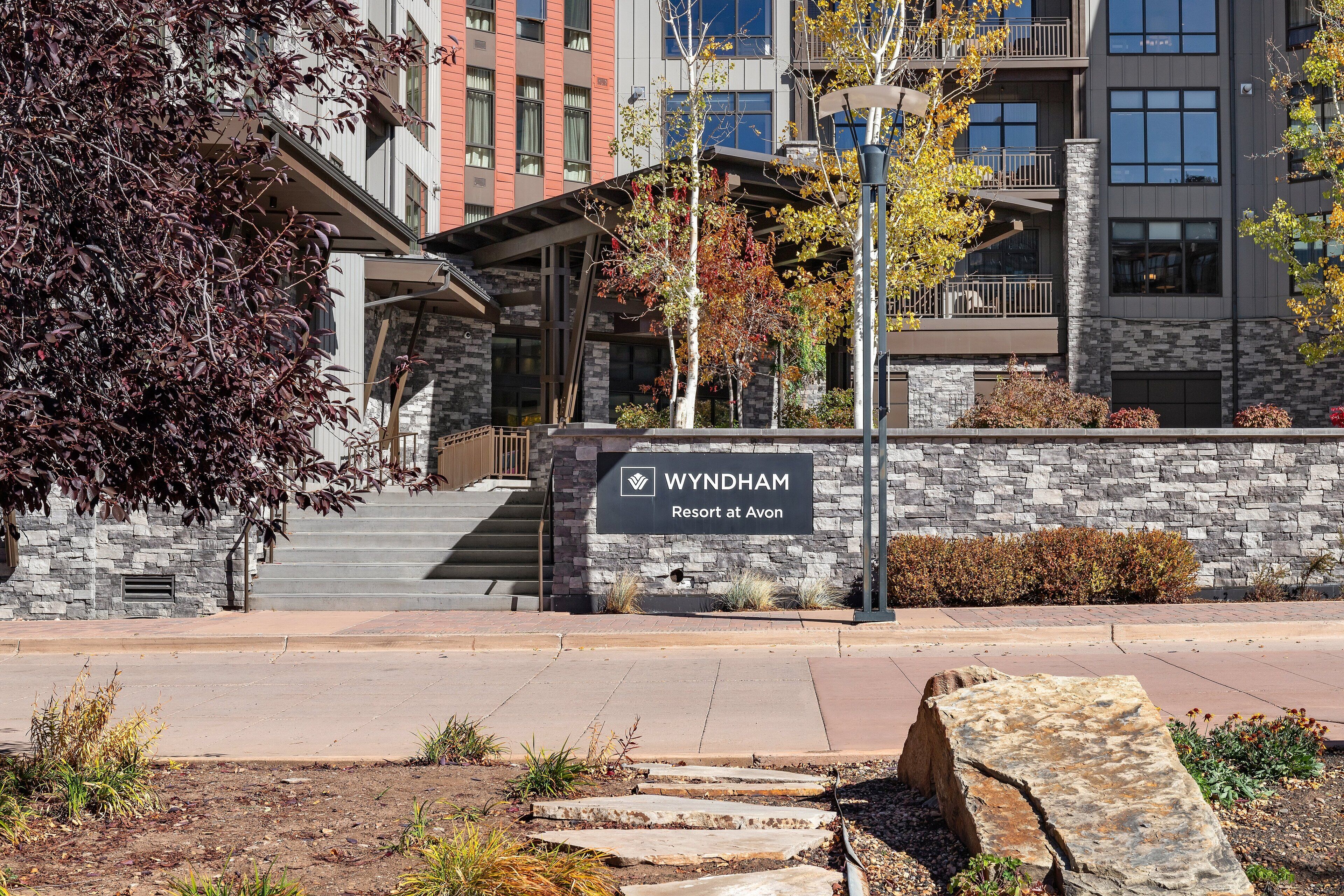 A stone building with a sign reading "Wyndham Resort at Avon."
