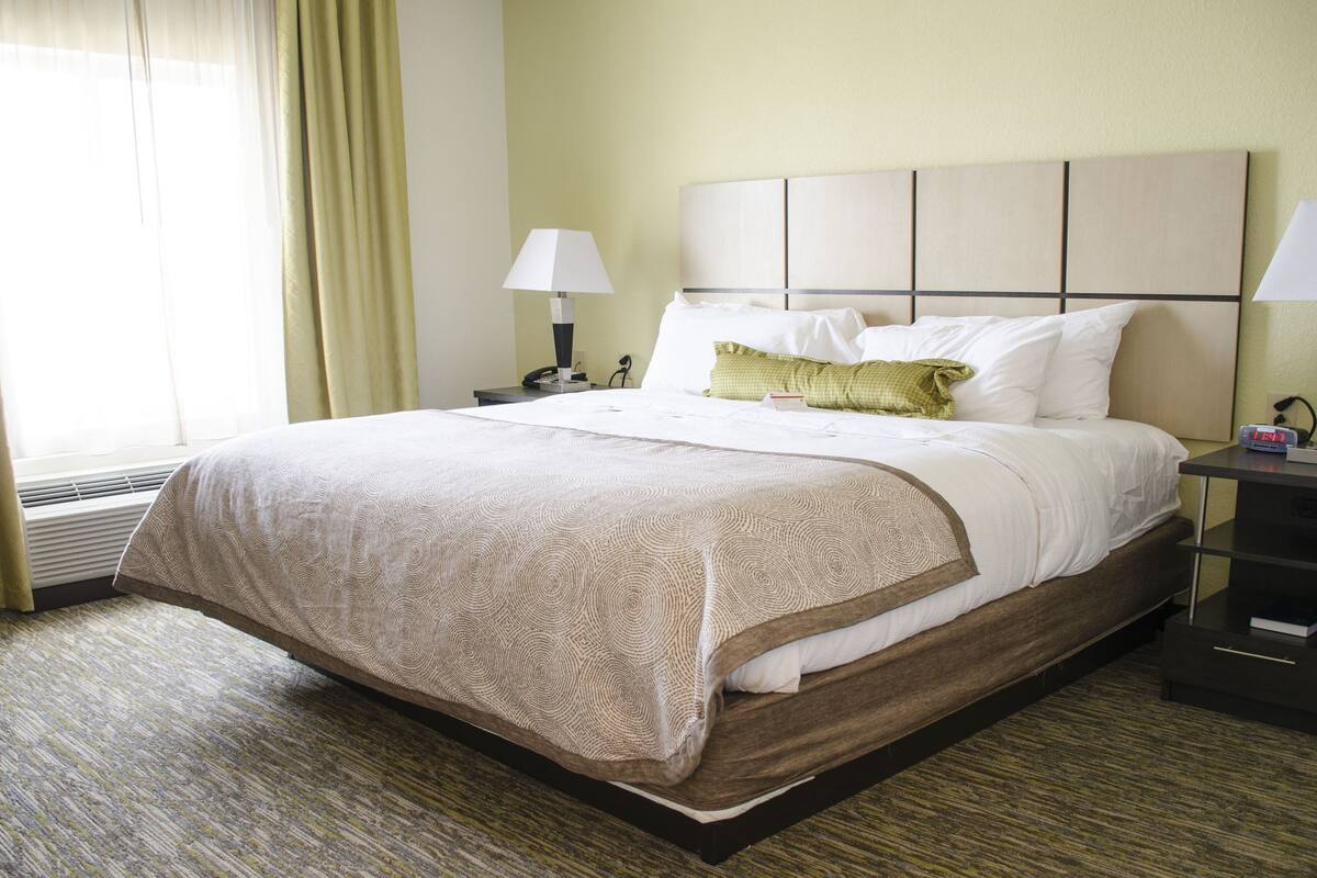 desk, laptop workspace, blackout curtains, iron/ironing board